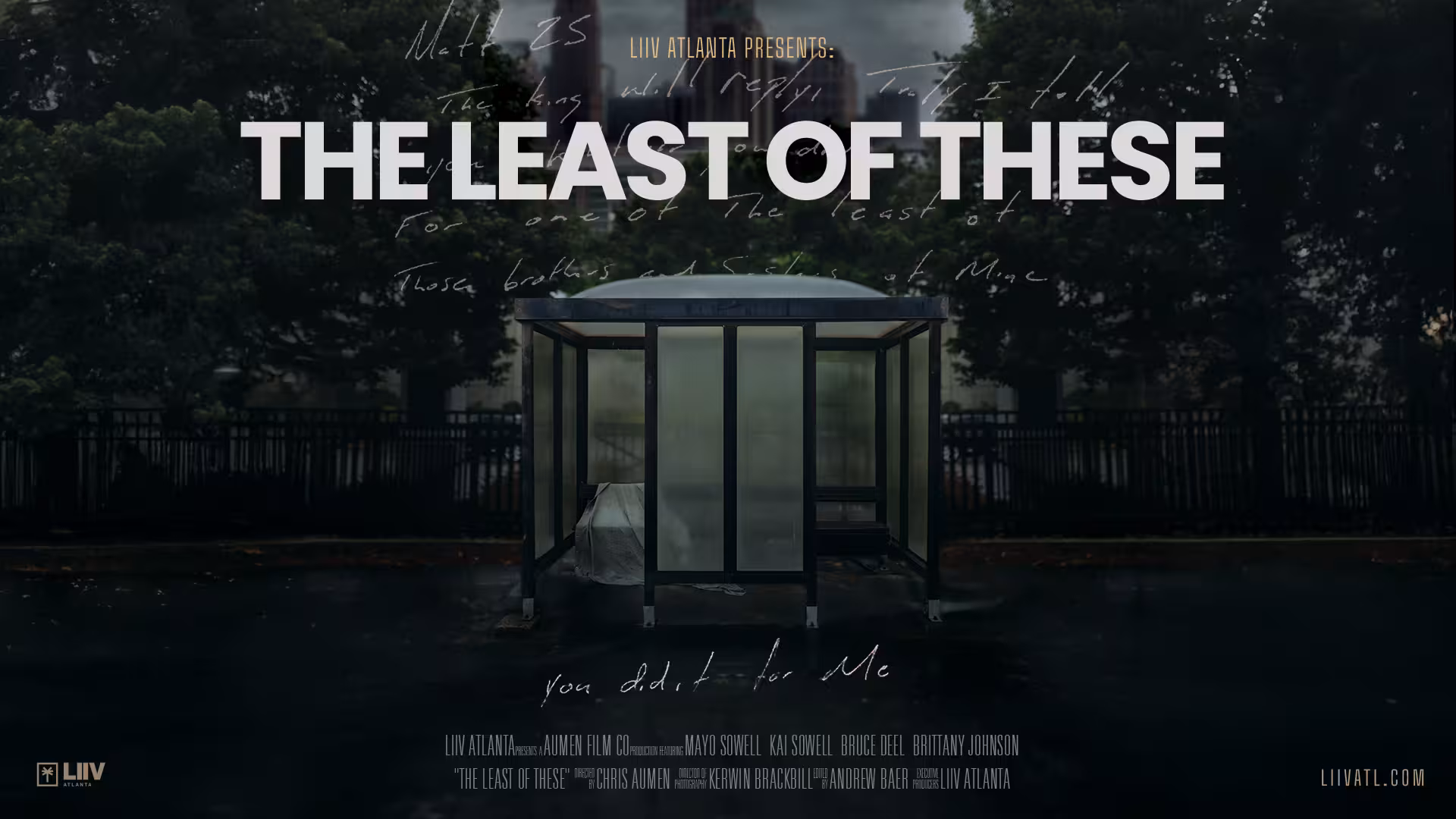 Key art for The Least of These — a rainy city bus stop at dusk with a figure wrapped in white inside; handwritten Matthew 25 verse floats across the sky above the title.